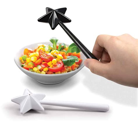 Cast a culinary spell with wand-designed salt and pepper shakers